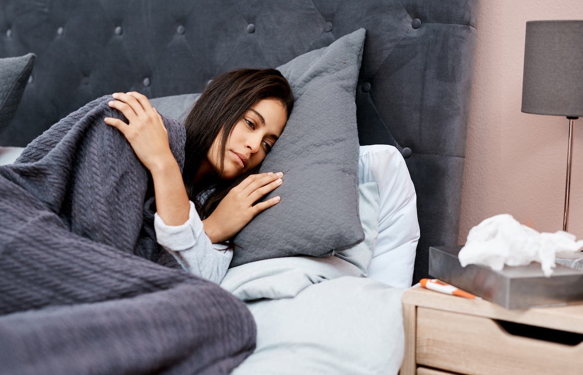 Featured image for Sleeping More When You’re Sick Is *Totally* Normal—And Evidence of Your Immune System in Action