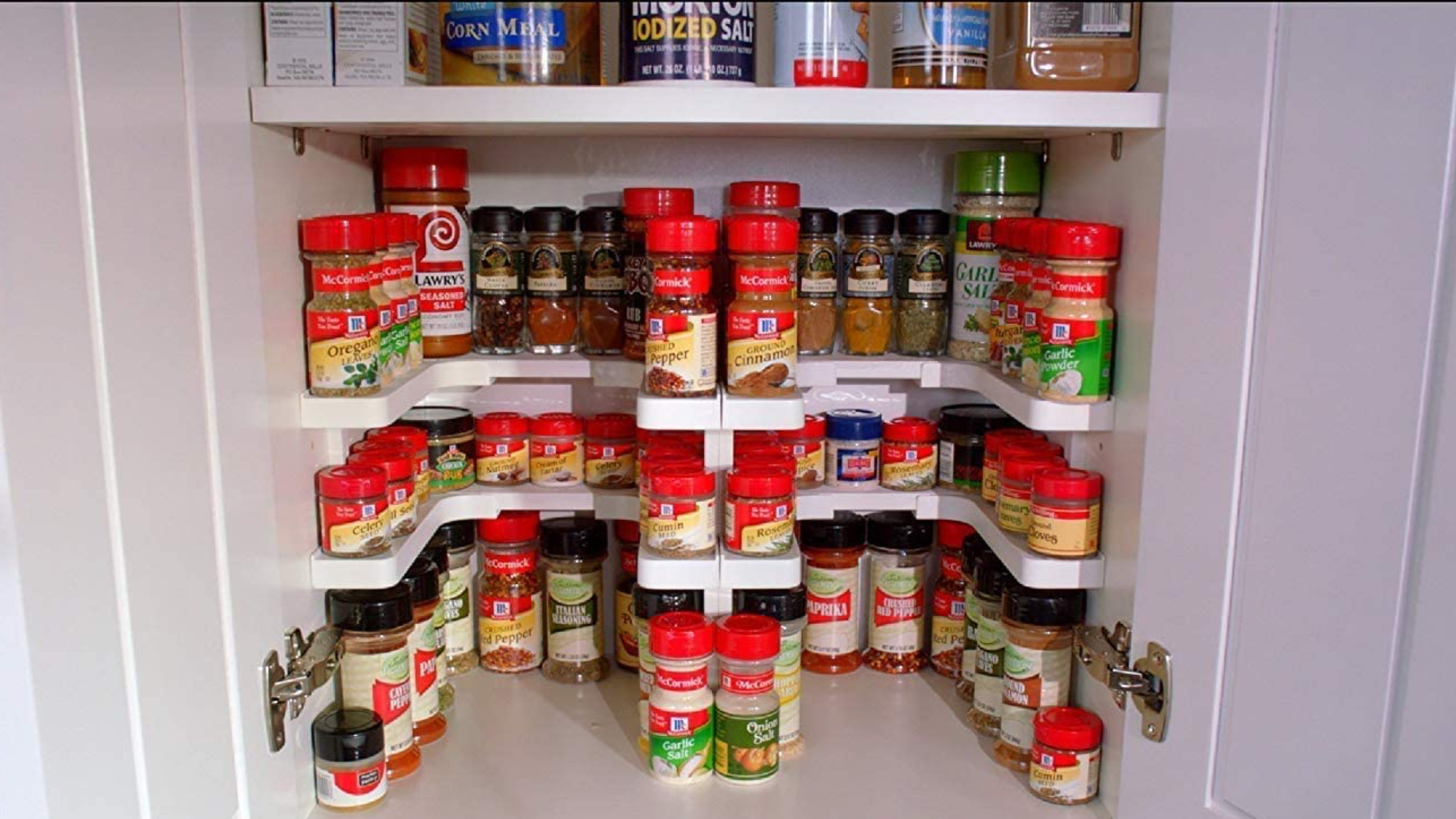 plastic racks that sit inside your cabinet to hold spice bottles