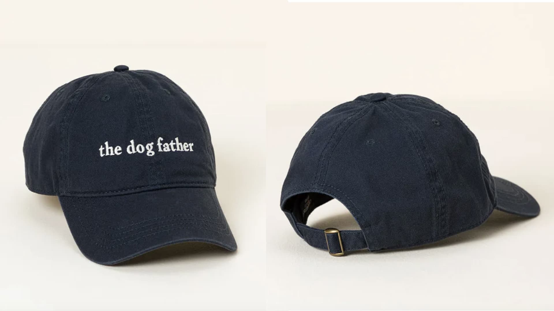 An embroidered "the dog father" baseball cap. 