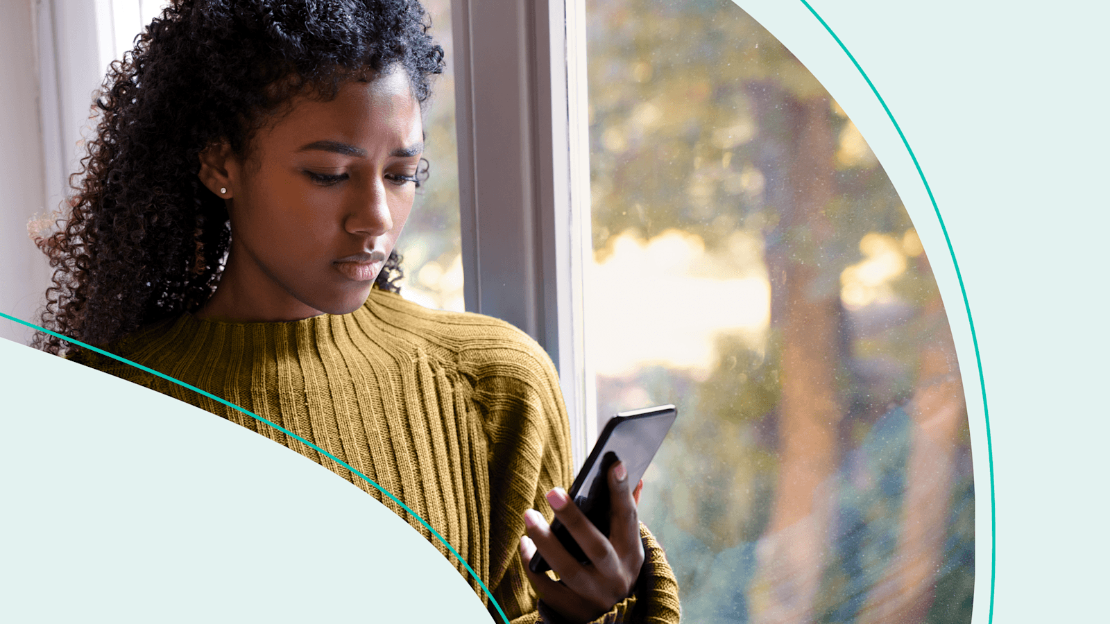 Woman appears concerned while reading phone