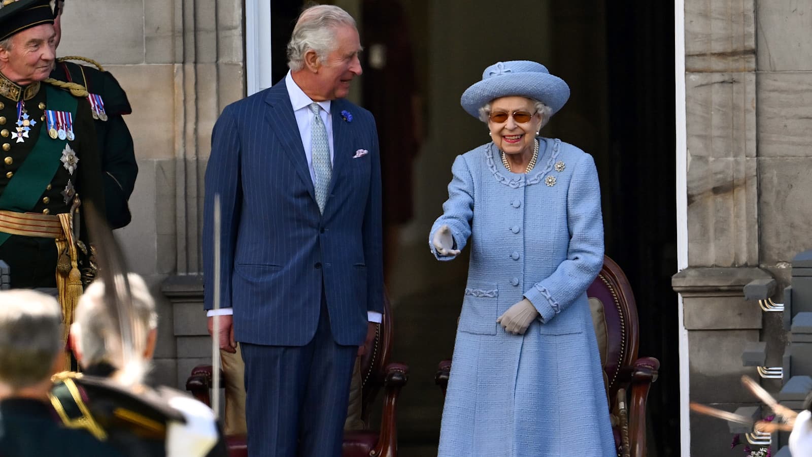 Queen Elizabeth smiling and greeting