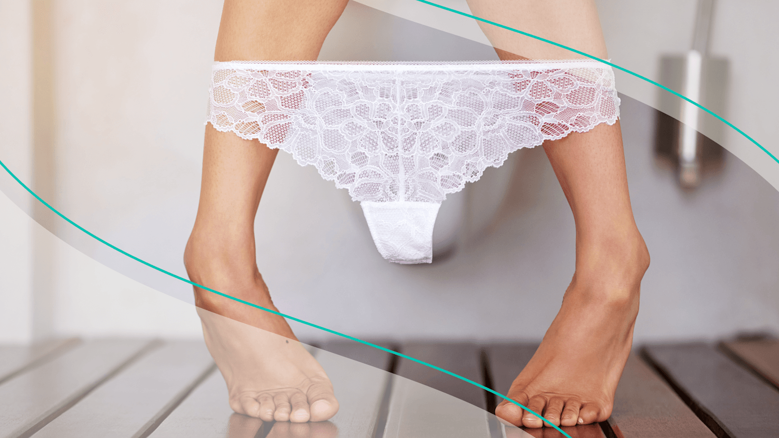 A woman's legs with white lace underwear pulled down to ankles