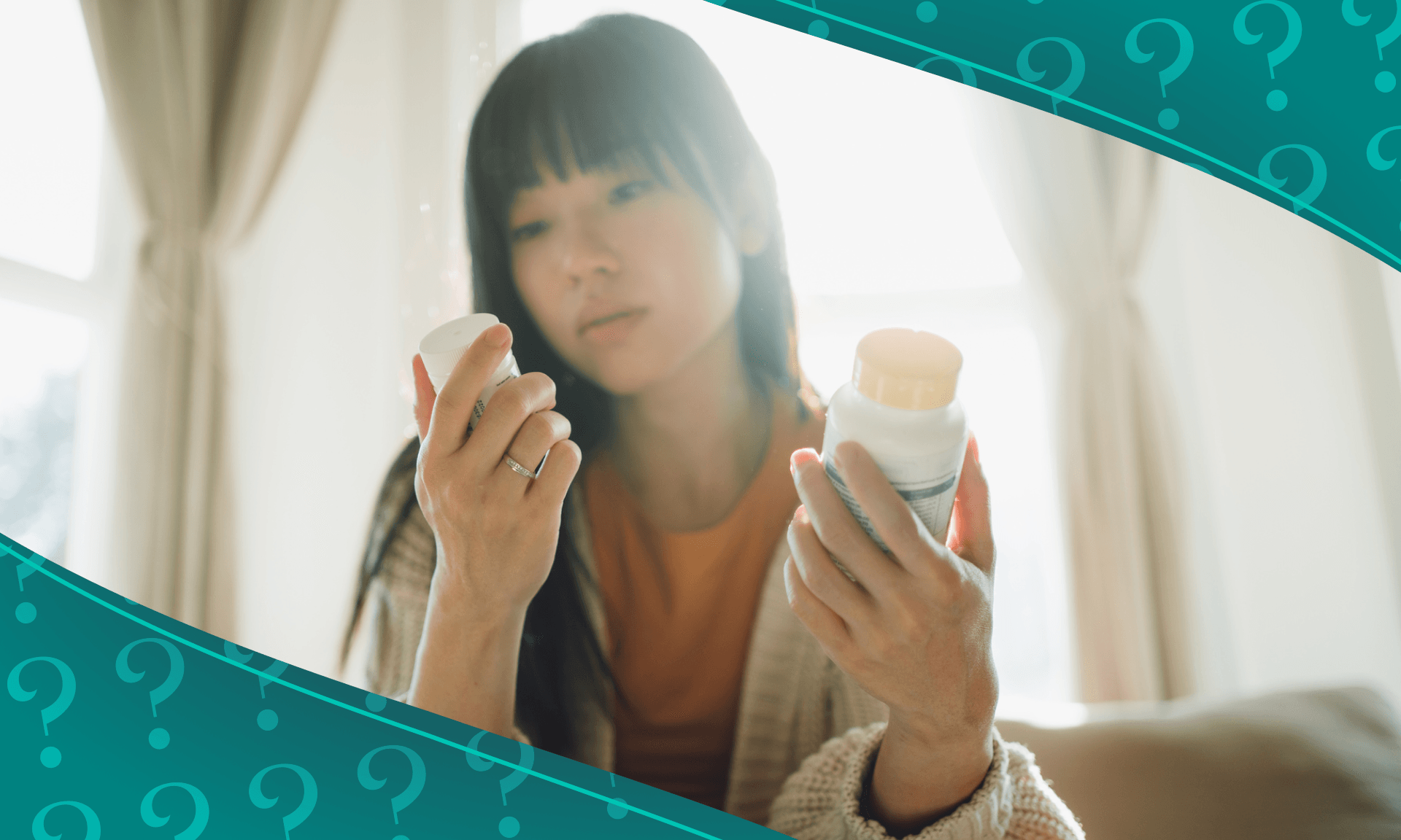 A woman examining two medication bottles