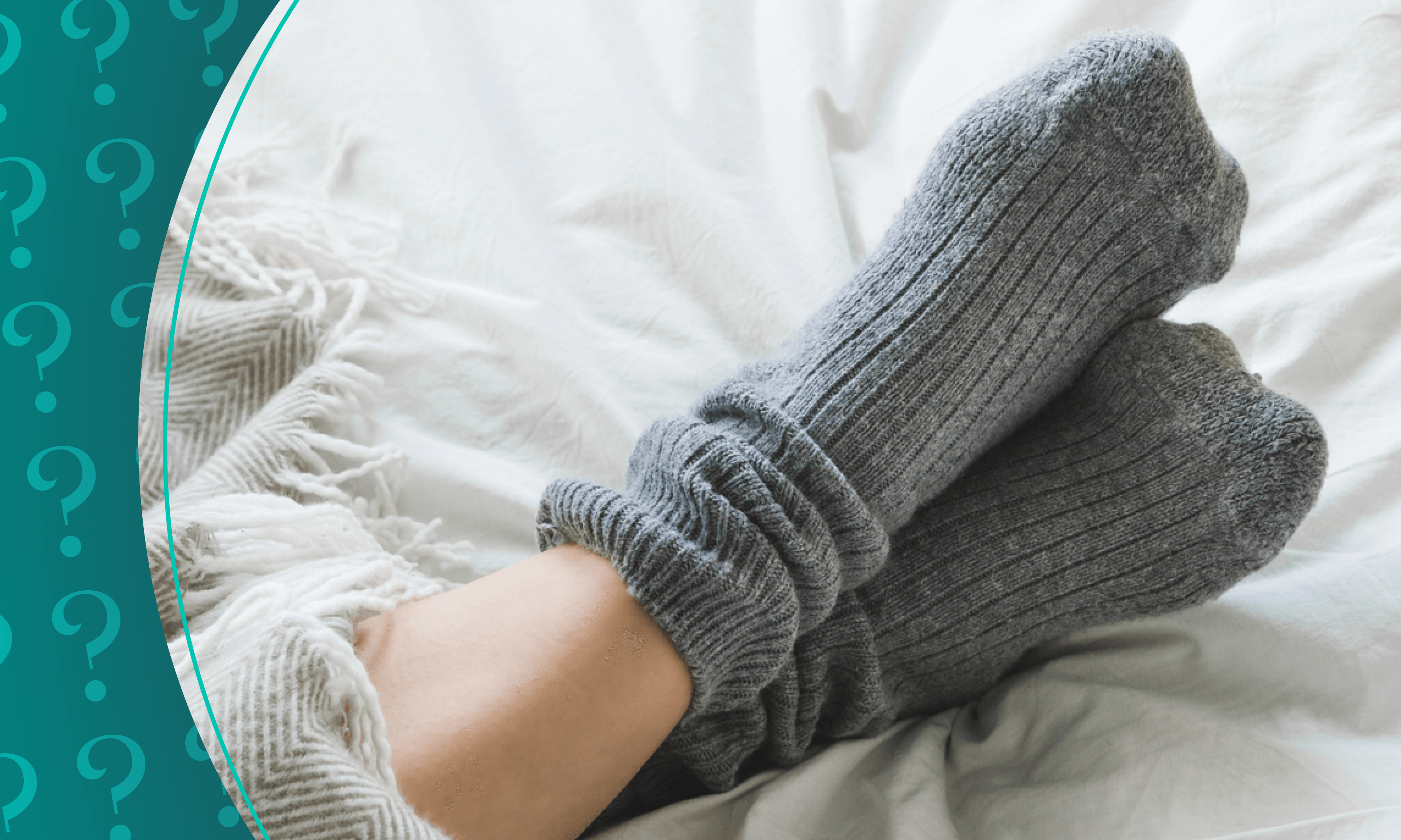 A pair of feet wearing gray knit socks