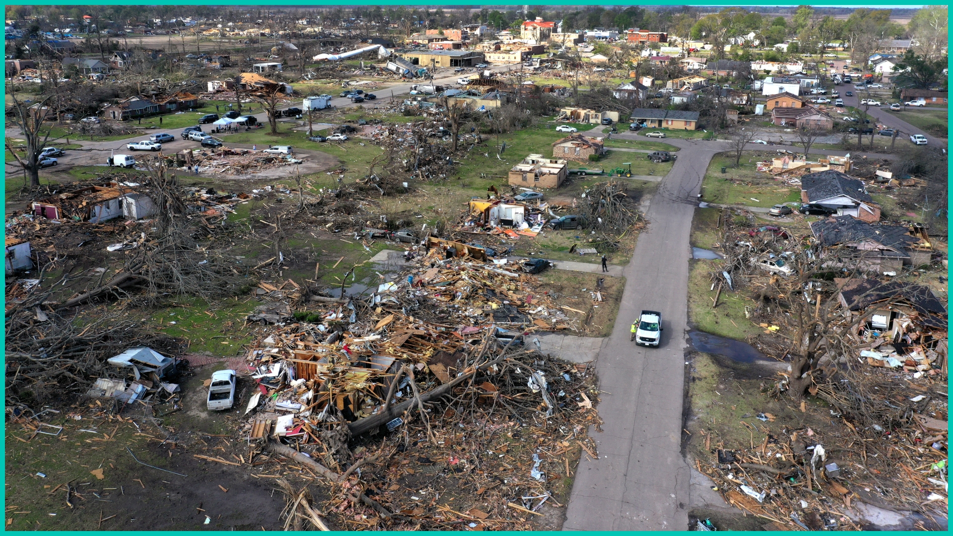 In an aerial view, piles of debris remain where homes once stood before Friday's EF-4 tornado