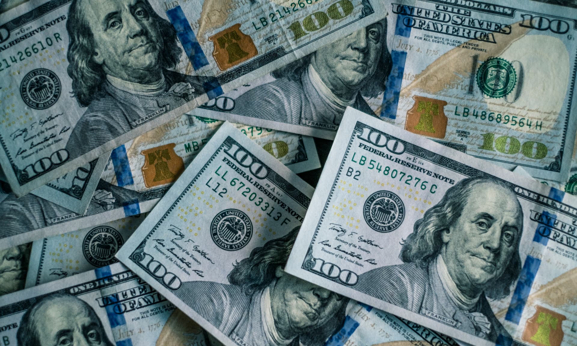 Hundred dollar bills spread around