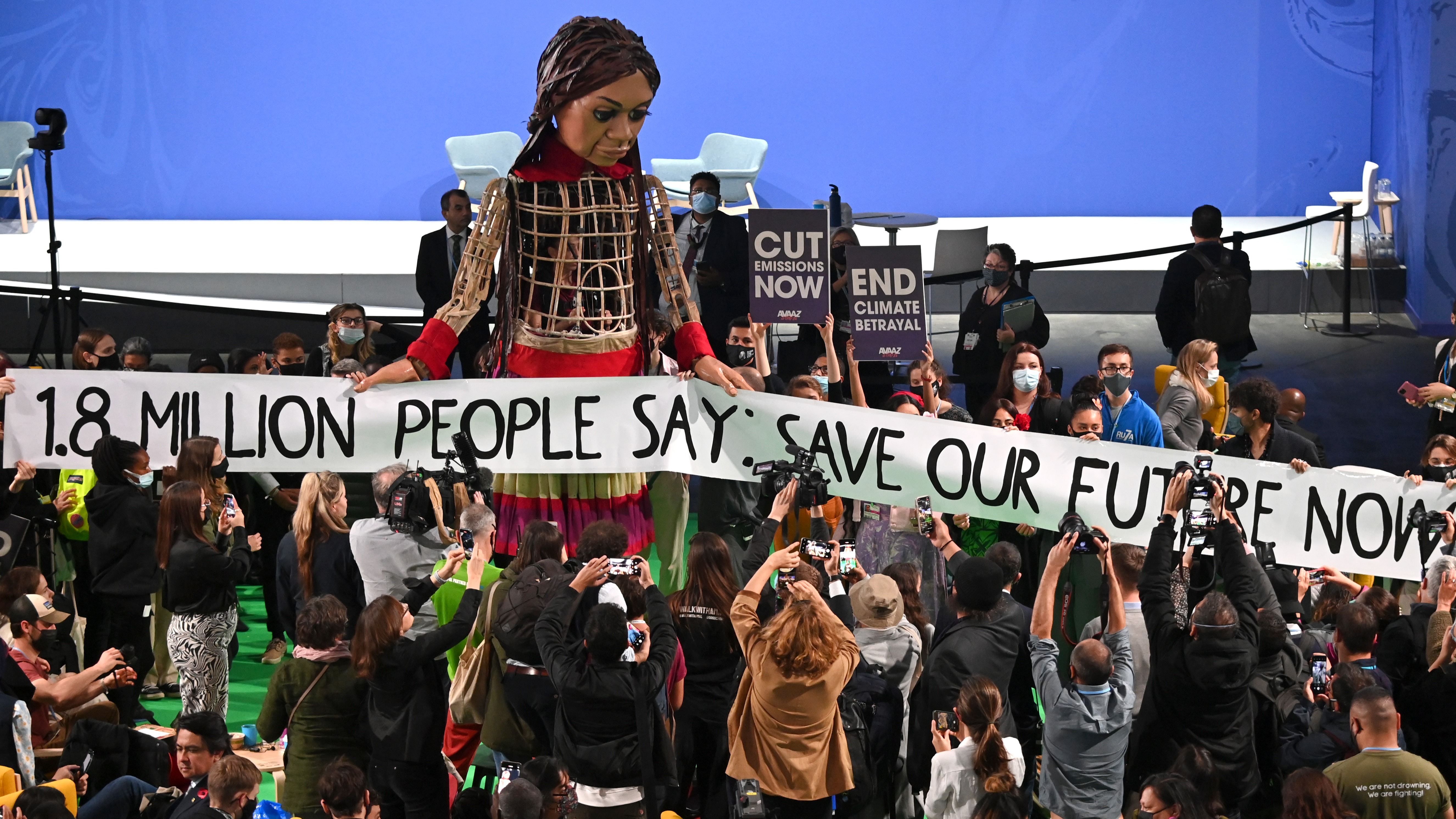 Little Amal, a giant puppet depicting a Syrian refugee girl, during COP26 on November 9, 2021 in Glasgow, Scotland.