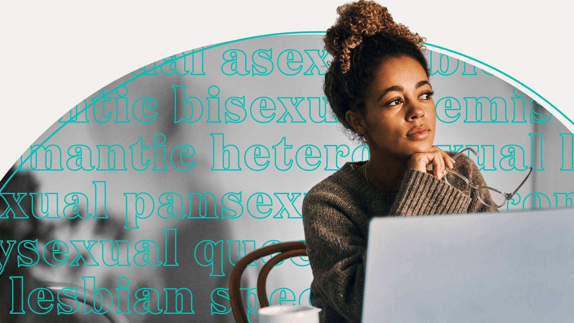 A woman sitting at her desk and thinking