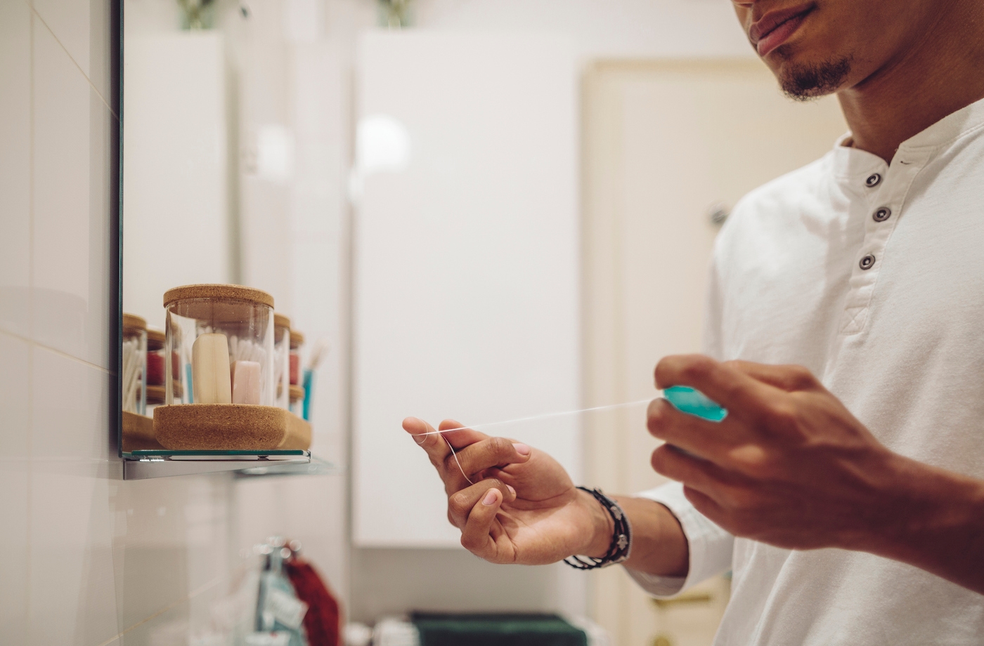 Featured image for OK, TMI: What Does It Mean If Your Floss Is Stinky?