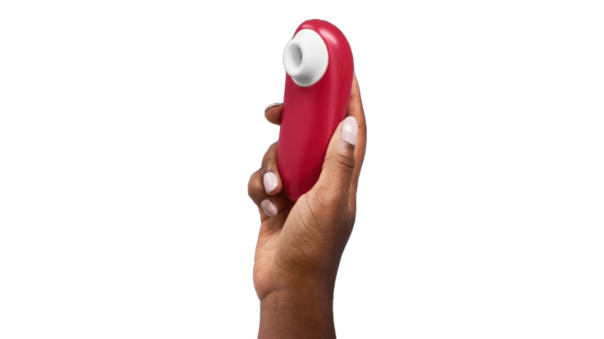 Woman holding clitoral vibrator in red with white suctioning mechanism