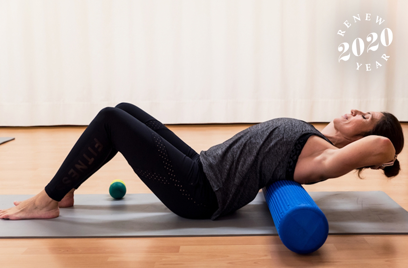 Featured image for How to use your foam roller for lymphatic drainage (because it works for that too)