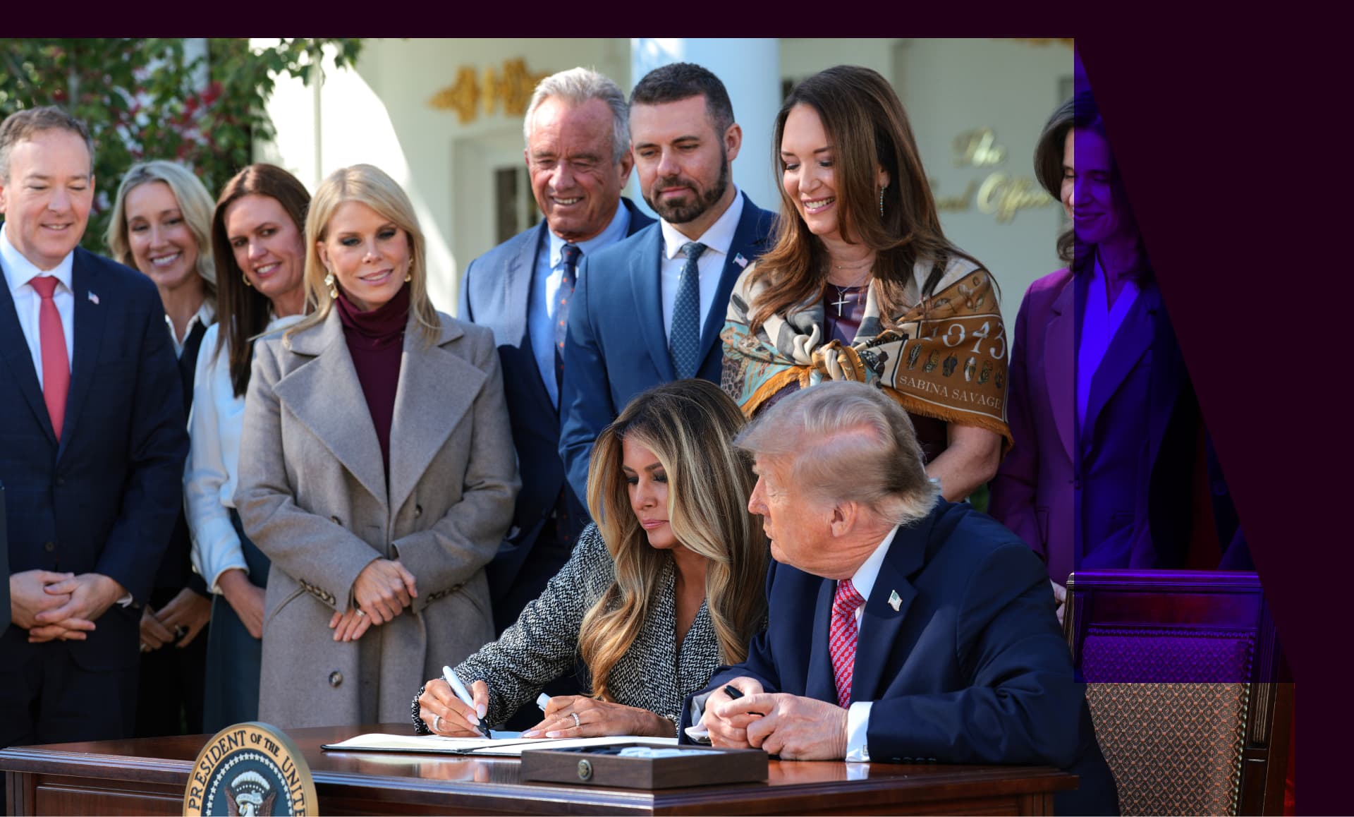 . President Donald Trump and first lady Melania Trump sign an executive order in the Rose Garden of the White House on October 19, 2026 in Washington, DC.