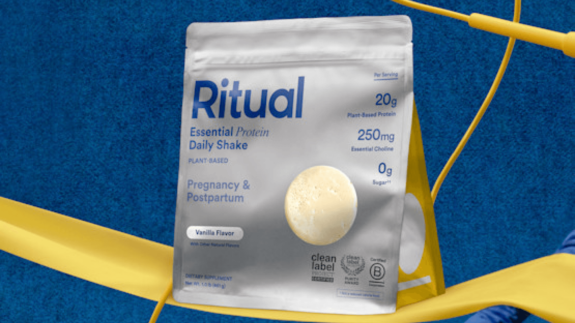 Pouch of Ritual protein powder on blue and yellow background