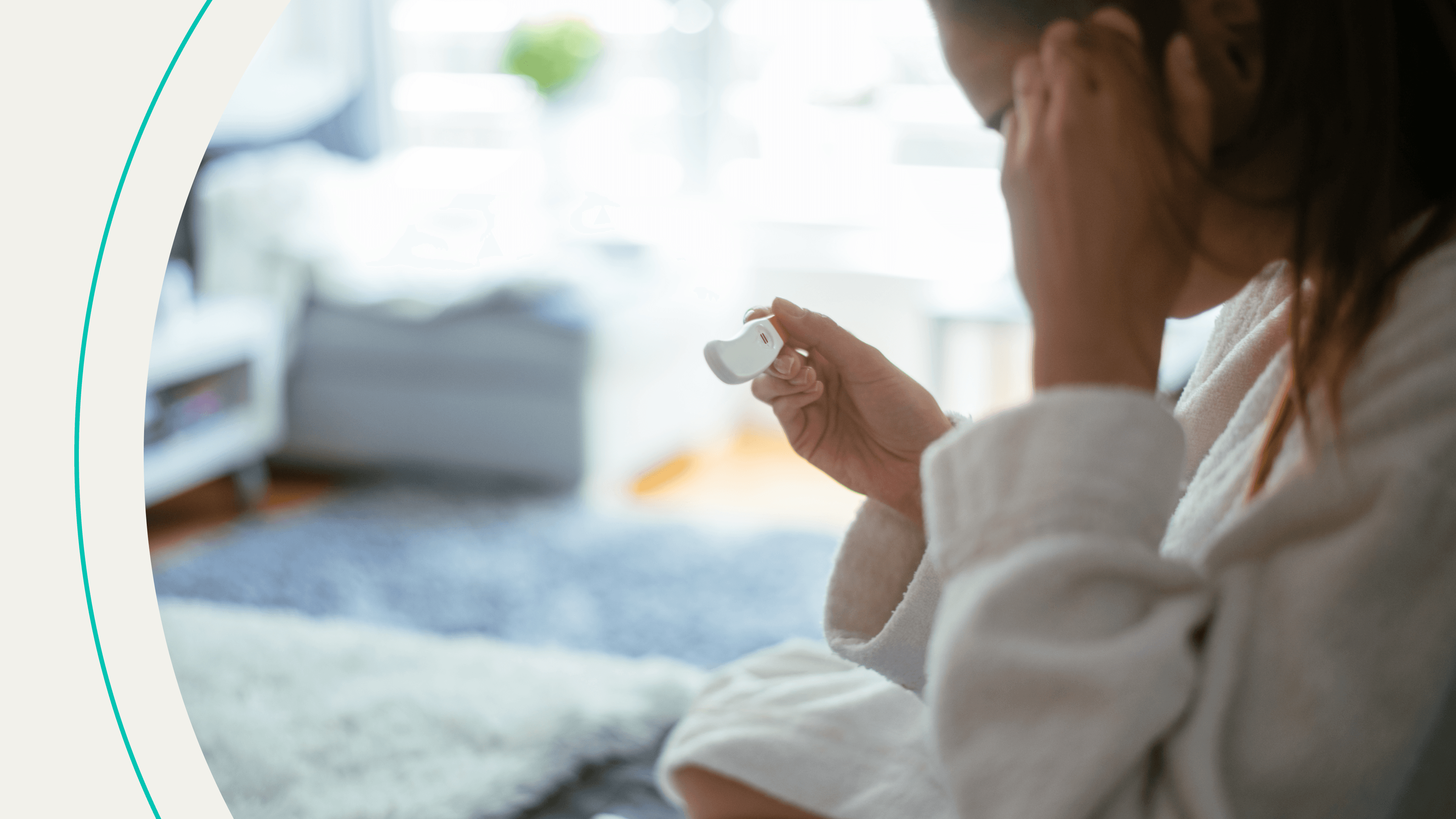 A woman holding a pregnancy test