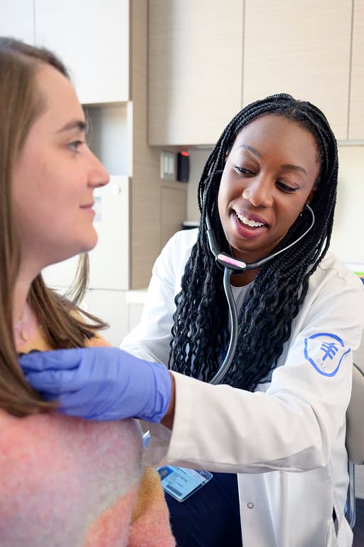 doctor treating patient