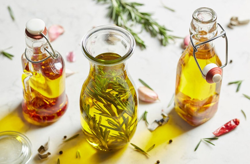 Featured image for How To Make Rosemary Oil in Your Slow Cooker (or Instant Pot) With Just 2 Ingredients