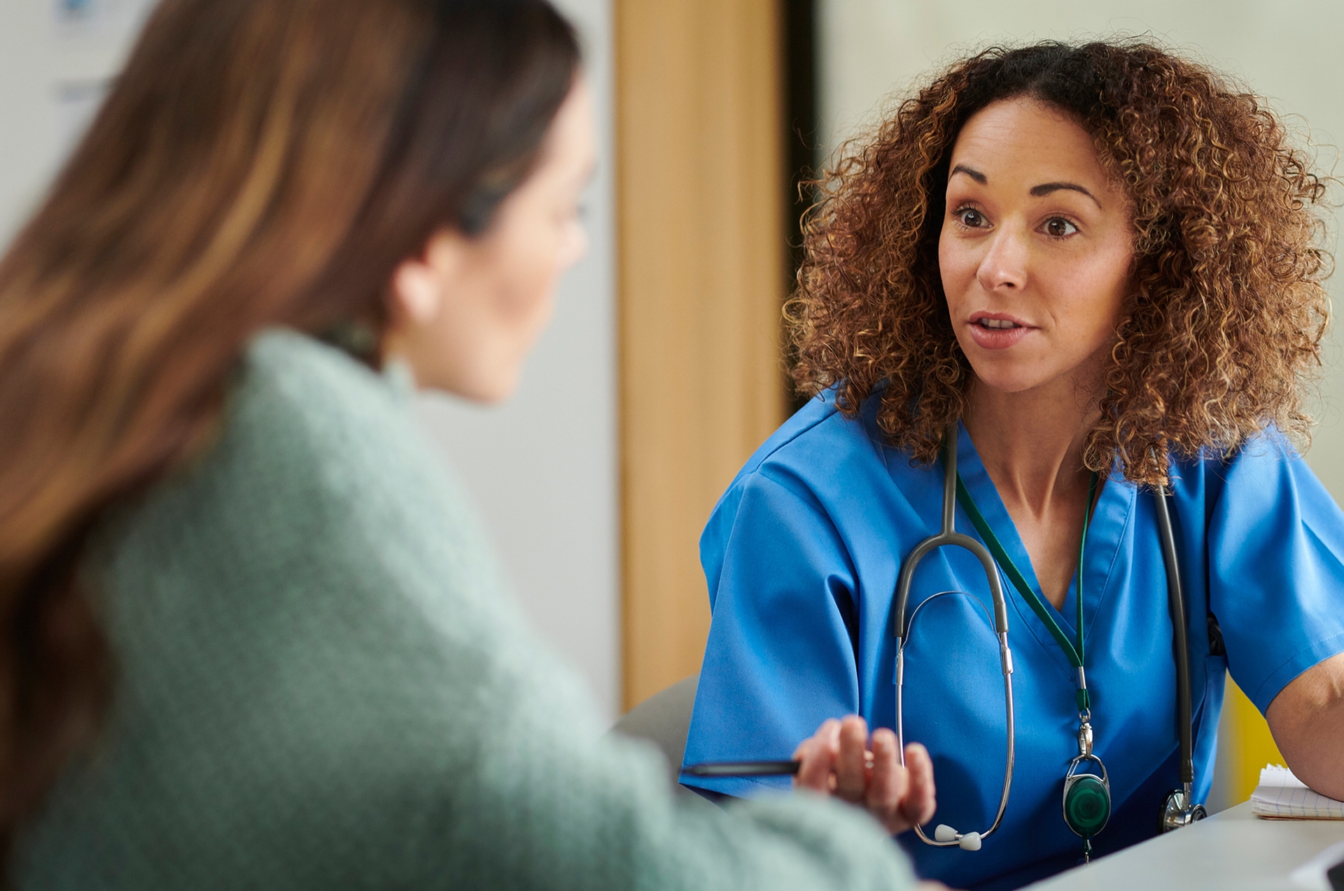 Woman prioritizes her health by seeing a doctor.