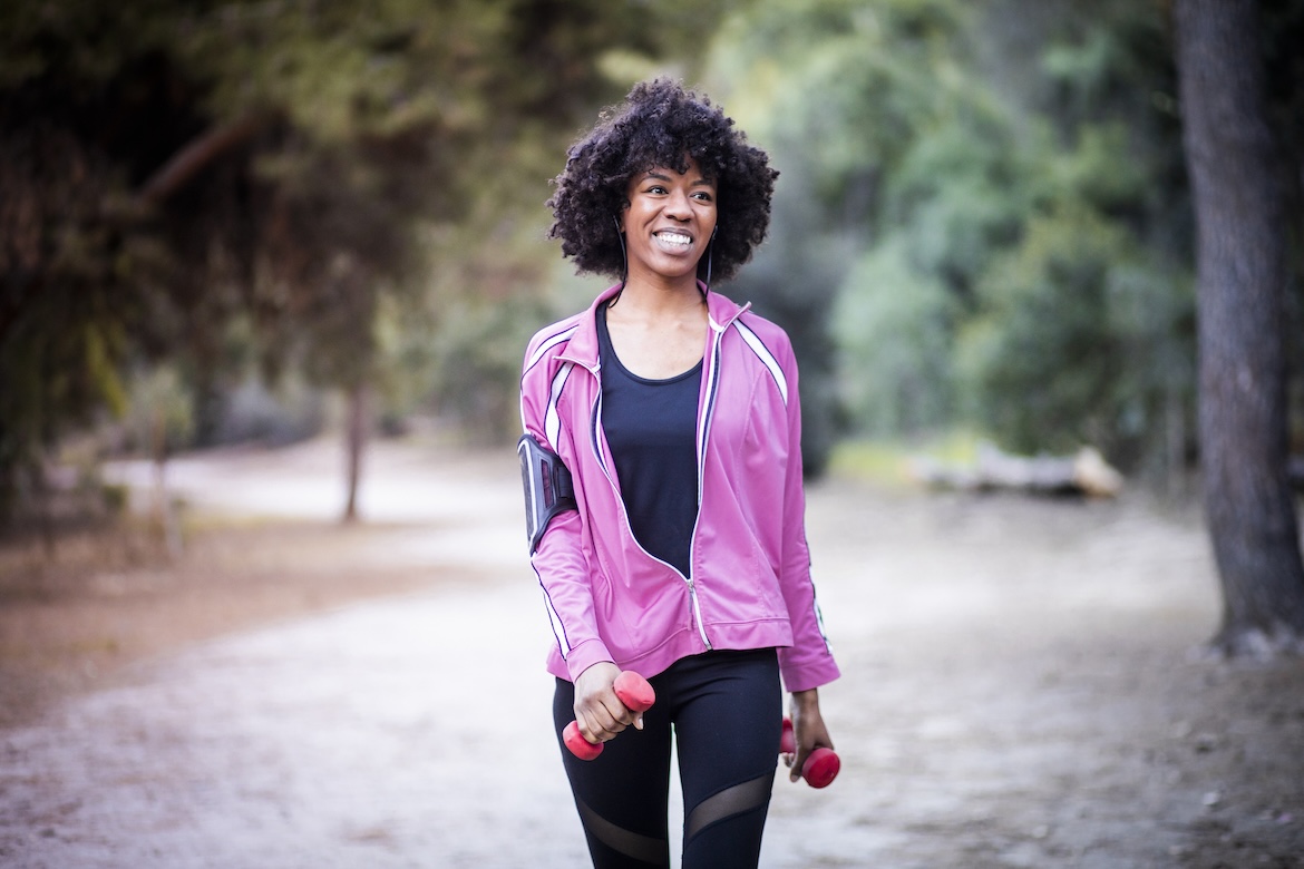 Featured image for 9 Trainer-Approved Arm Exercises To Do While You're Walking